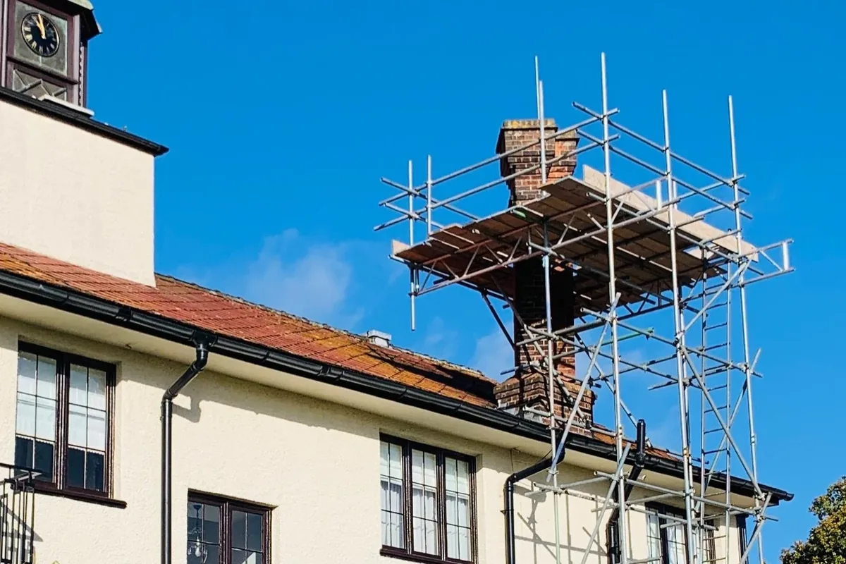 Chimney repair in Wingham, Kent requiring full scaffold access to rebuild a damaged brick chimney stack