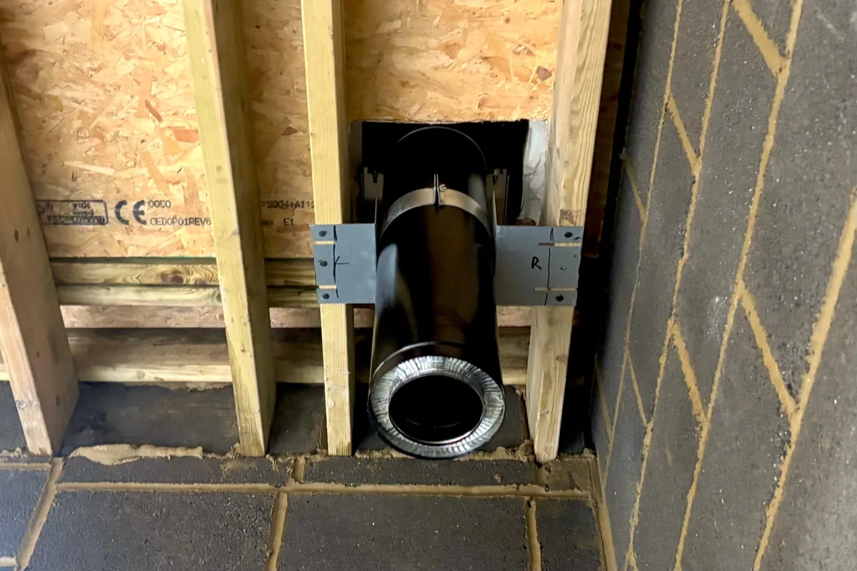 Twin wall insulated flue installed at first fix stage through a new ground floor extension in Folkestone, Kent